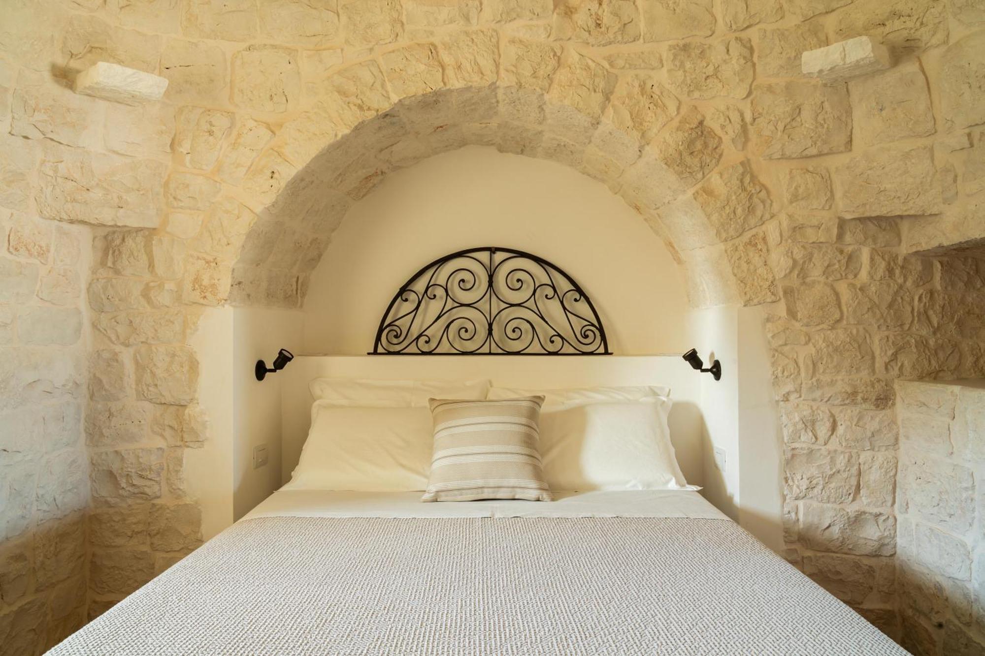 Trullo Jale - Boutique Apartments 오스투니 객실 사진